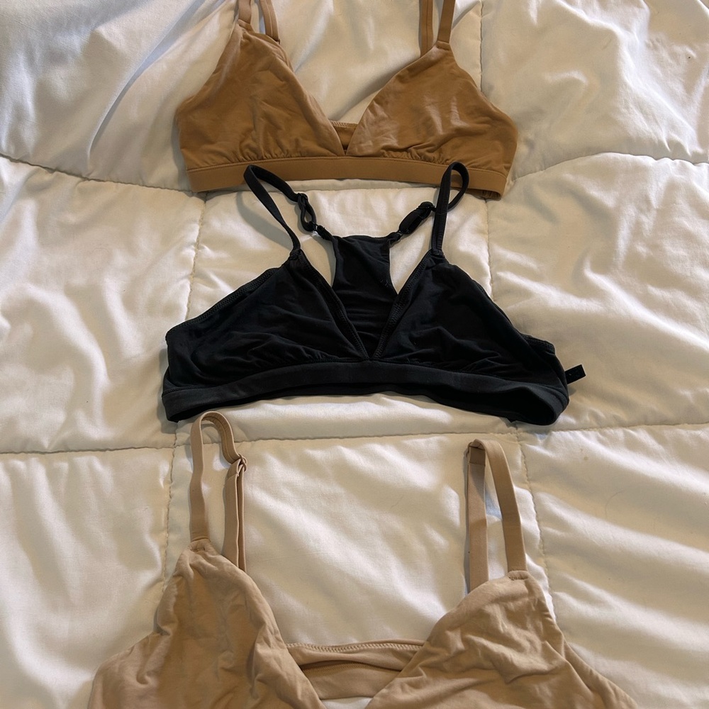 3 Skims triangle bralettes. Size medium. Black, Clay and Ochre.